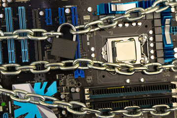 censorship, restrictions and restrictions on a Internet. concept, motherboard in chains under lock...