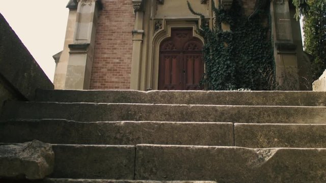 Gothic crypt in cemetery with stairs