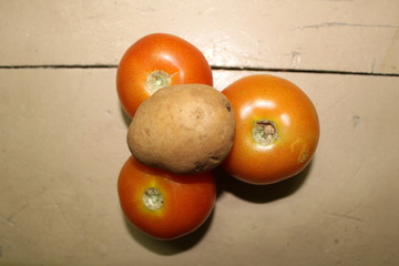 tomatoes on wooden table