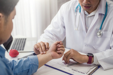 Doctor checking health primary of male patient for consultation health in hospital health. health and doctor concept.