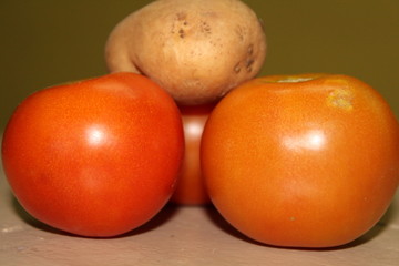 fresh tomatoes on a black background
