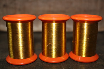 Metal and wooden silk thread