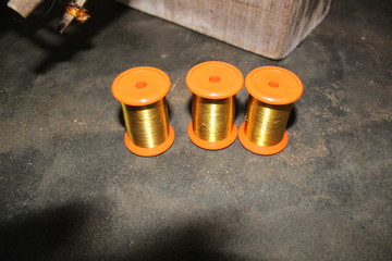 Metal and wooden silk thread