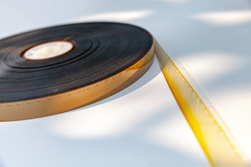 8 mm film reel on white background