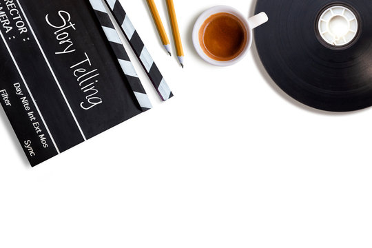 Story telling text title on movie clapper board  and coffee cup