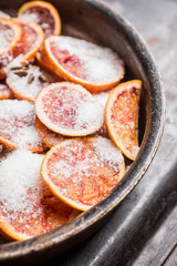 Making jam with red oranges. Selective focus. Shallow depth of field.