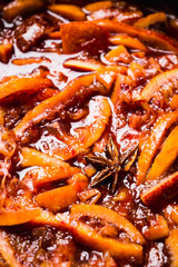 Making jam with red oranges. Selective focus. Shallow depth of field.