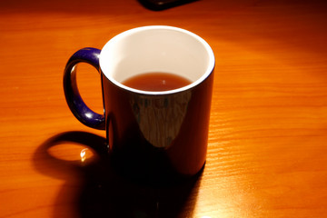 Mug of tea on the table