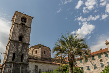 Fototapeta na wymiar Tower of an old church in the old town of the medieval city of Kotor, Montenegro