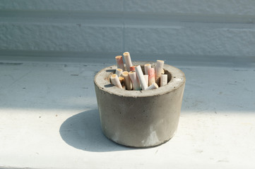 Cigarette butts in the ashtray