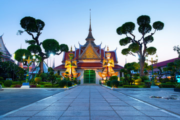 The atmosphere inside Wat Arun temple landmark and iconic of Bangkok during sunset.