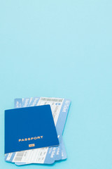 Passport and air tickets on a blue background. mockup empty blank, copy space