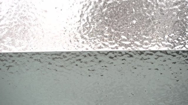 Breaking Ice On Car Door Window Revealing Truck In Distance 002