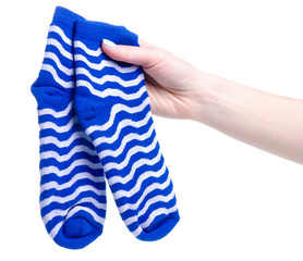 Pair blue sock in hand on white background isolation