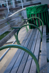 Green Bench and Trash Can