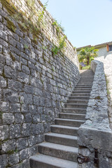 Fototapeta na wymiar Stone staircase in a mediaeval style town