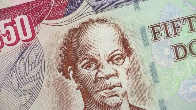 Jamaica 50 dollar bill rotating. Samuel Sharpe. Jamaican currency, money. 4K stock video footage