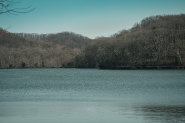 Obraz na płótnie Canvas Blue Lake Beneath Rolling Hills