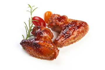 Spicy Roasted chicken wings with barbecue sauce, american food, close-up, isolated on white background