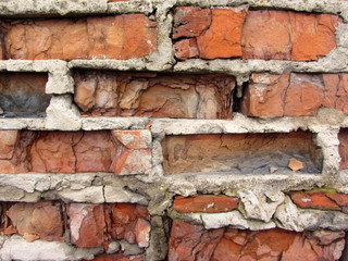 old red brickwork delaminating bricks with wall cavities