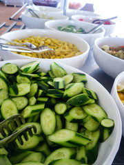Cucumber salad and cold appetizer bowls