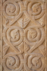 medieval stone carving on the catholic cathedral in Coimbra, Portugal