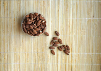 Healthy food  for background image close up almond nuts. Texture Nuts on the cup plate