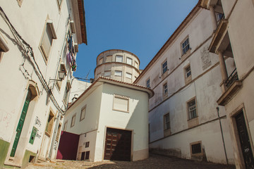 steep slope of a narrow street in Coimbra, Portugal