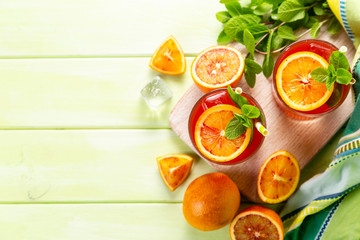 Bloody orange drink and ingredients, copy space