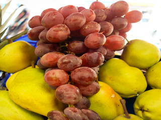 Naklejka na ściany i meble Pears grapes, freshness background.