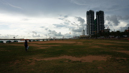 Galle Face beachfront urban park area in Colombo Sri Lanka Asia with sky scrapers in 2018