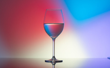 wine glasses dishes on a colored background
