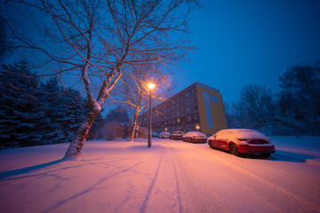 Snow in the night city,