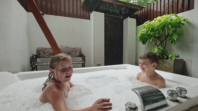 Kids having fun in bathtub