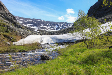 Spring trip in the mountains of northern Norway, river in Tosholdalen