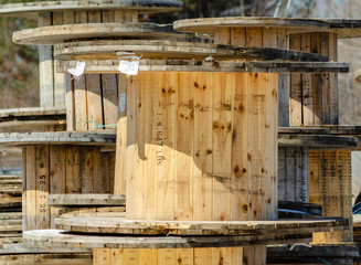 Stacks of empty wooden cable spools