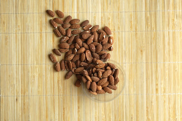Healthy food  for background image close up almond nuts. Texture Nuts on the cup plate