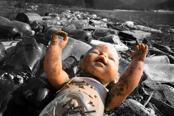 Abandoned doll as a symbol