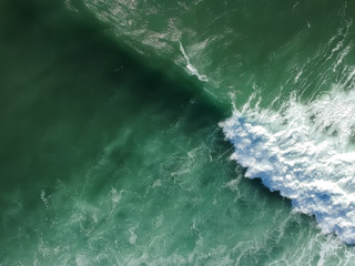 Fototapeta na wymiar Aerial view of huge ocean wave. Drone Photo.