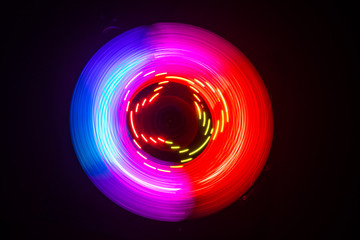 Concept of speed - Trail of fire and smoke - Vinyl record. Burning vinyl disk. Turntable vinyl...