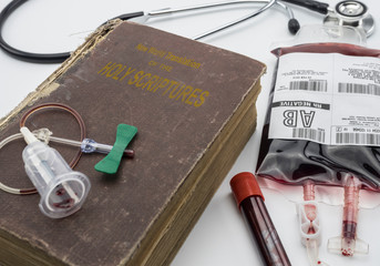 bible of the witnesses of jehova, concept of denial of blood transfusions, conceptual image,...