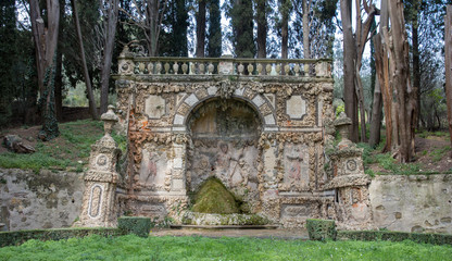 Fototapeta na wymiar Secret garden with sculptures on the fille Gambéraia in Settignano. Upper garden in Villa Gamberaia.