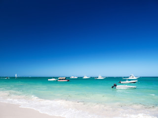 Fototapeta na wymiar Boats and yachts floating in caribbean sea