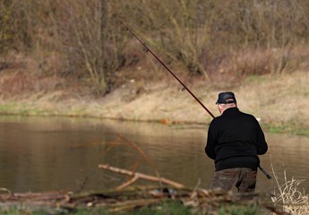 fisherman with fishing rod, Poland