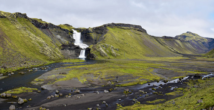 Panoramic view of Eldgja Canyon floor with the flow of Nordari-Ofaera river and Ofaerufoss waterfall in southern highlands of Iceland.