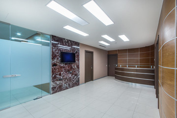 Lobby entrance with reception desk  in a modern business center