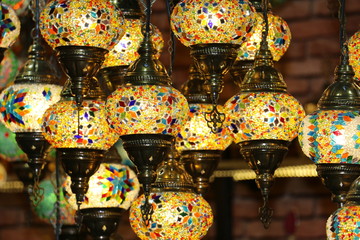 Traditional bright decorative hanging Turkish lamps and colourful lights with vivid colours  in the Istanbul Bazaar, Turkey