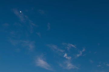 Naklejka na ściany i meble Beautiful and peaceful cloudy sky with Moon