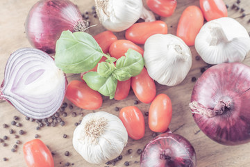 Tomatoes and basil soup ingredients, flat layout image.