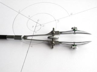 vintage classic drafting drawing tool: double head ruling pen over spiral draw